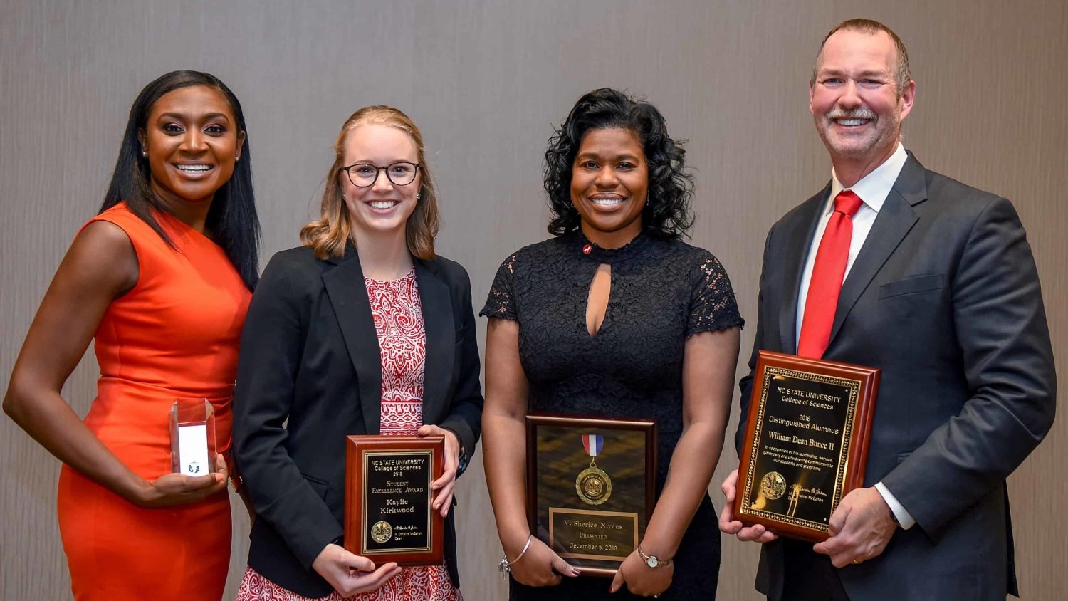 College of Sciences Award Winners pose with their awards.