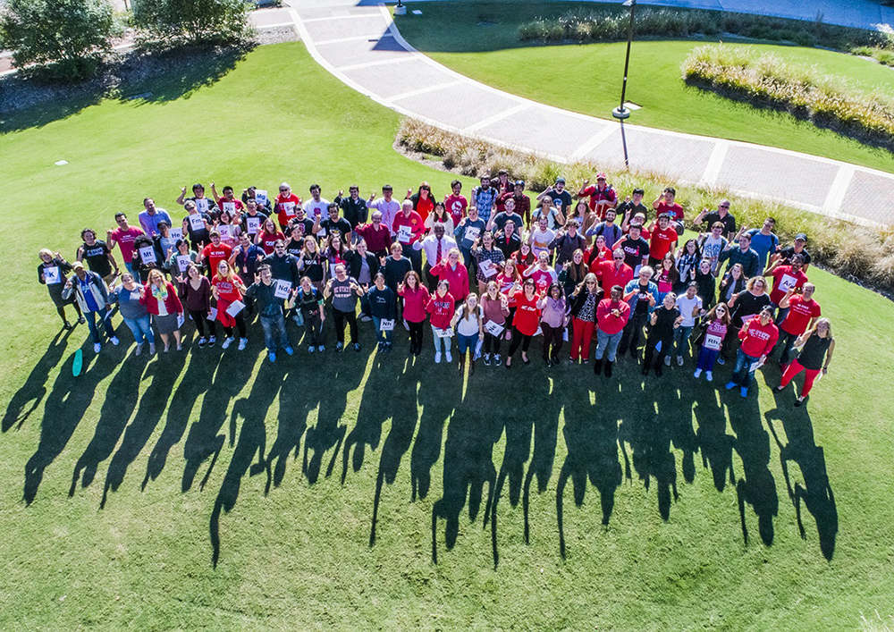 Department of Chemistry Group Picture carrying chemistry symbols signs