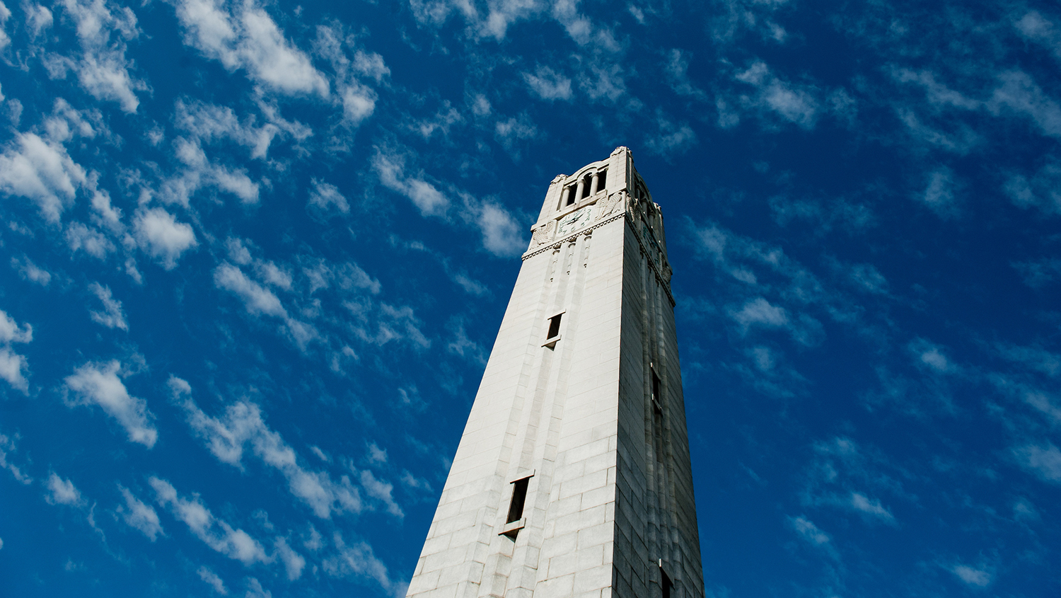 NCSU Belltower with dark blue sky in background
