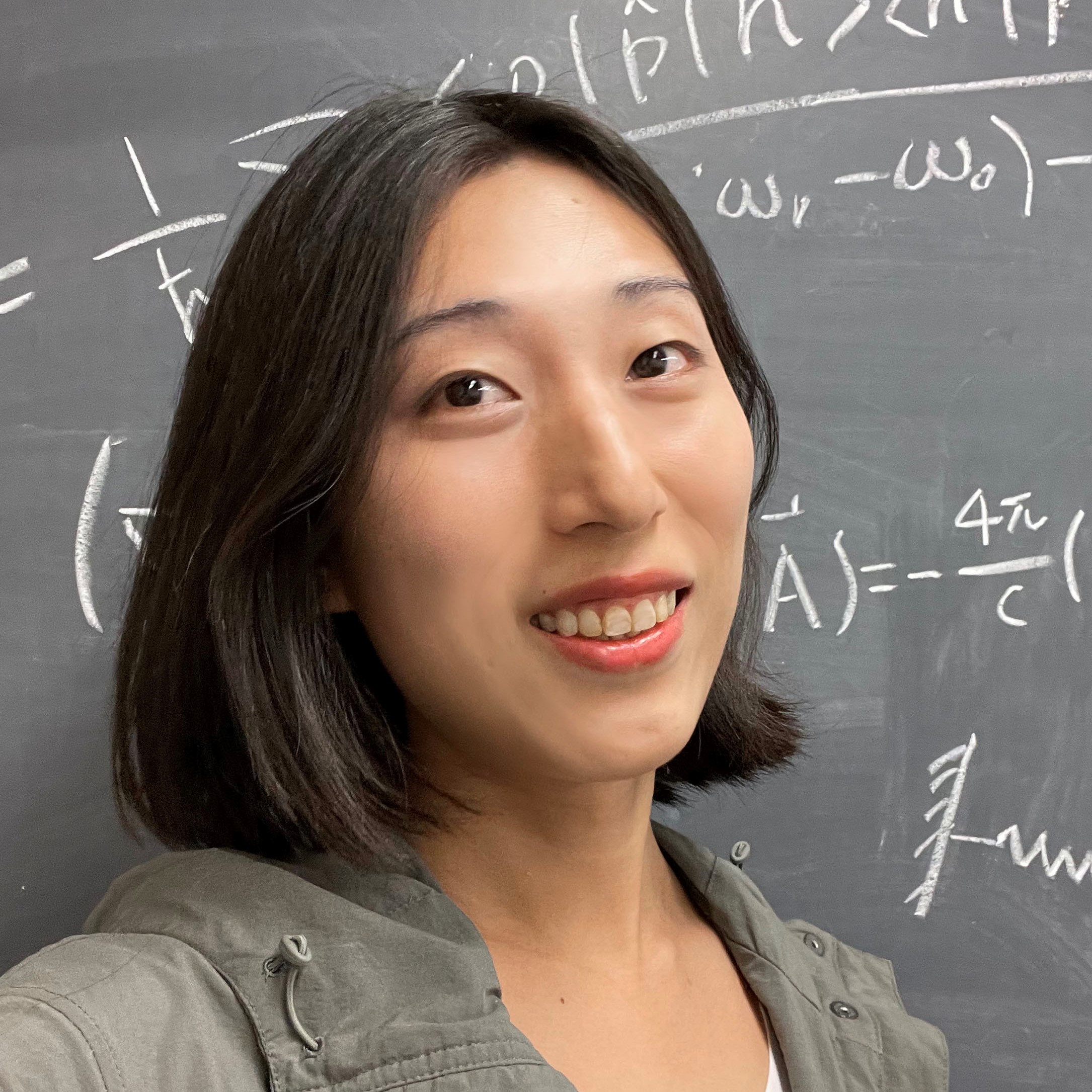 The image represents the headshot of Yuan Gao, a young adult with black hair. In the background one can see equations written on a chalkboard