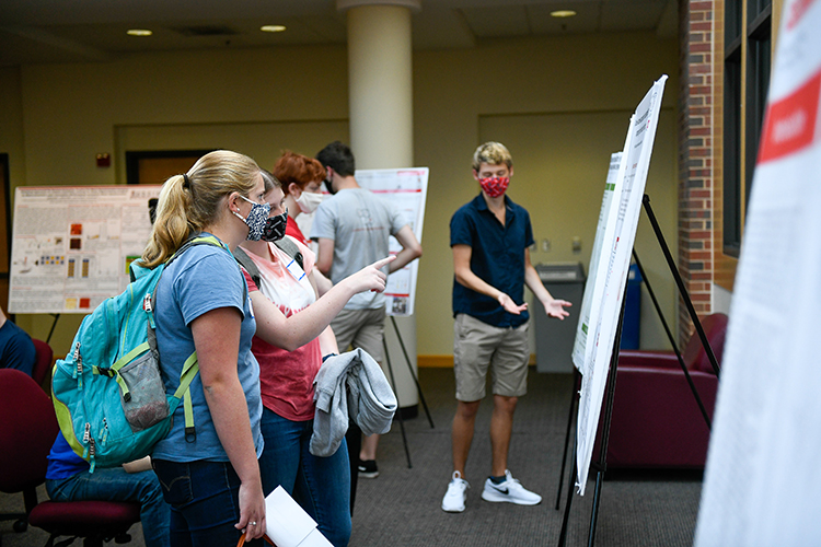 Current undergraduate researchers showcase their work during lunch at Labapalooza.