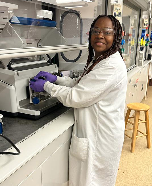 Chiamaka working in the lab