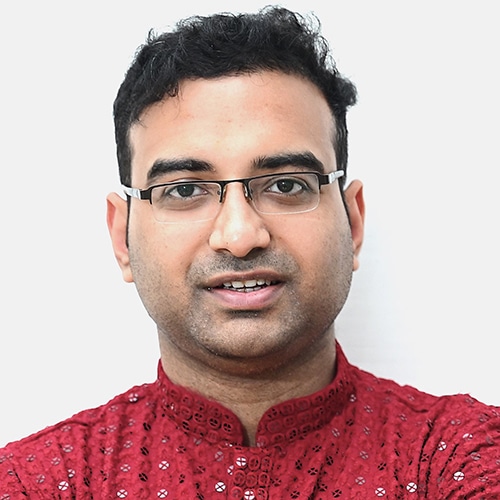 Photo of a young man wearing eyeglasses