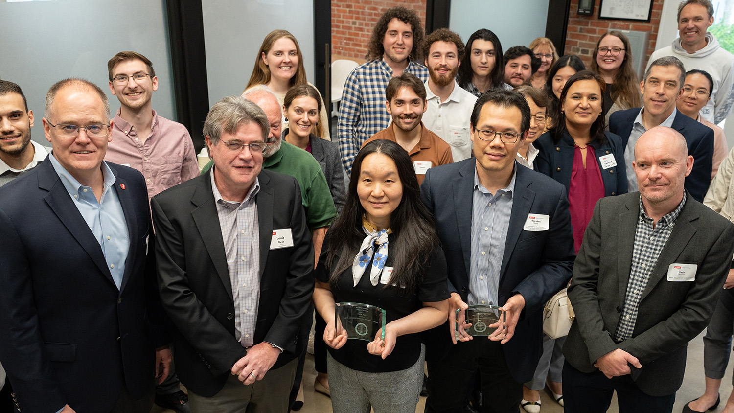 The attendees at the LORD Distinguished Professorship reception pose for a photo, including Yi Xiao and Wei-chen Chang