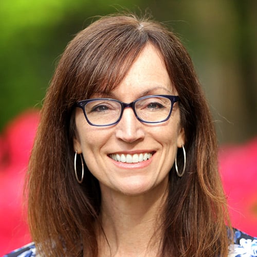 Headshot of a woman wearing eyeglasses