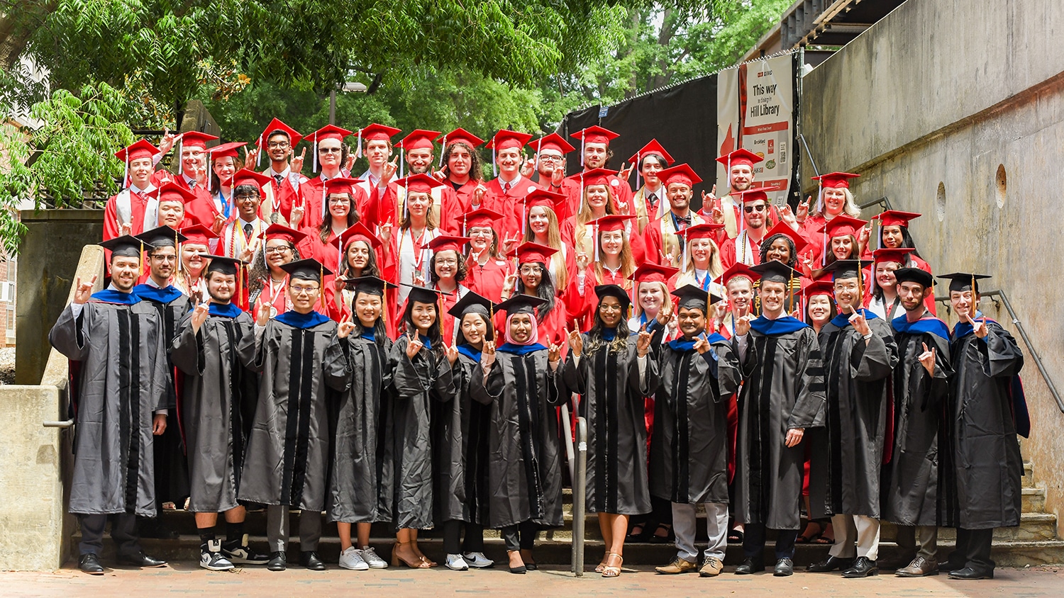 Photo of Spring 2024 chemistry graduates wearing caps and gowns